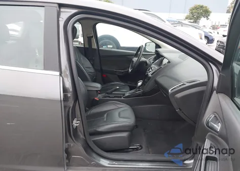 2015 Ford Focus Titanium z USA, uszkodzony, nr VIN 1FADP3N24FL386265